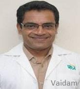 Dr. Madan Ballal