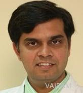 Dr. Karun Behal